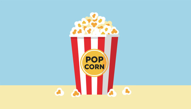 Classic red and white striped cardboard bucket filled with fresh popcorn on a simple bright blue and yellow background.