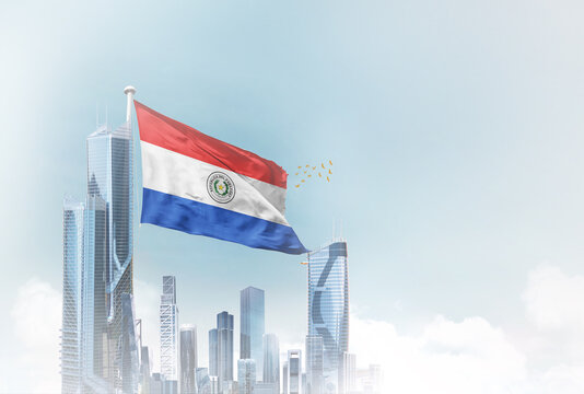 Paraguay flag waving with modern futuristic buildings. Paraguay national flag beautifully waving in the sky.