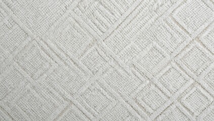 Fototapeta premium Textured fabric background with woven patterns in light beige and cream tones, creating a soft and cozy atmosphere