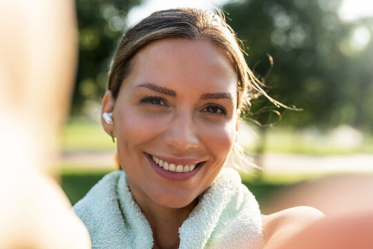 Selfie woman, happiness and nature fitness, exercise or post memory photo to social network, online app or media. Photography, cardio wellness or park athlete, runner or influencer streaming training.