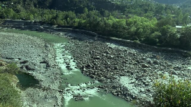 Panaromic view of small water channel at Mandi Distt Near IIT Kamand himachal pradesh india 025