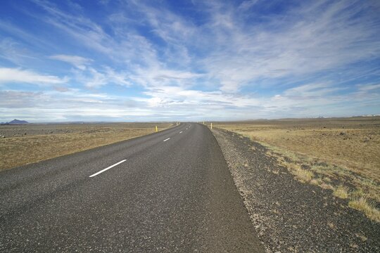 Road in wide landscape without vegetation, on the way to Dettifoss, East Iceland, Iceland
