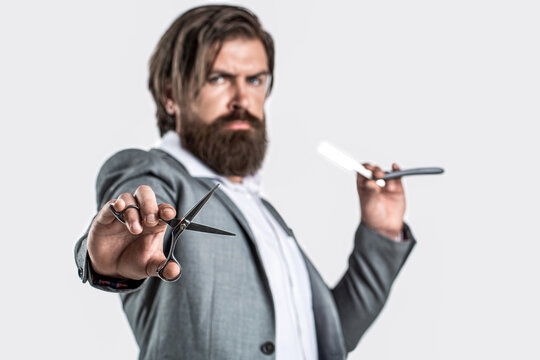 Vintage barber shop, shaving. Portrait bearded man. Mustache men. Brutal guy, scissors, straight razor. Bearded client visiting barber shop. Barber scissors and straight razor, barber shop, suit