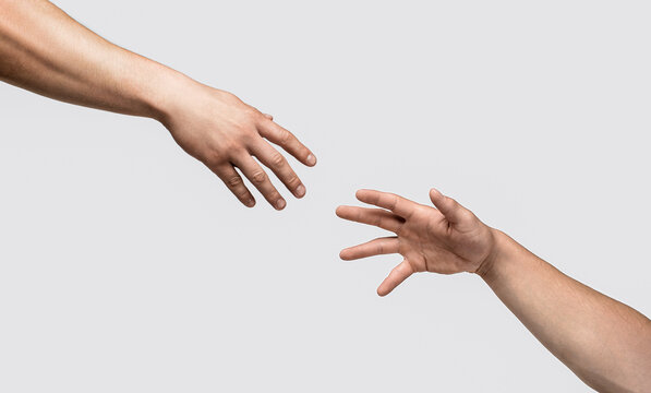 Helping hand concept and international day of peace, support. Helping hand outstretched, isolated arm, salvation. Close up help hand. Two hands, helping arm friend, teamwork