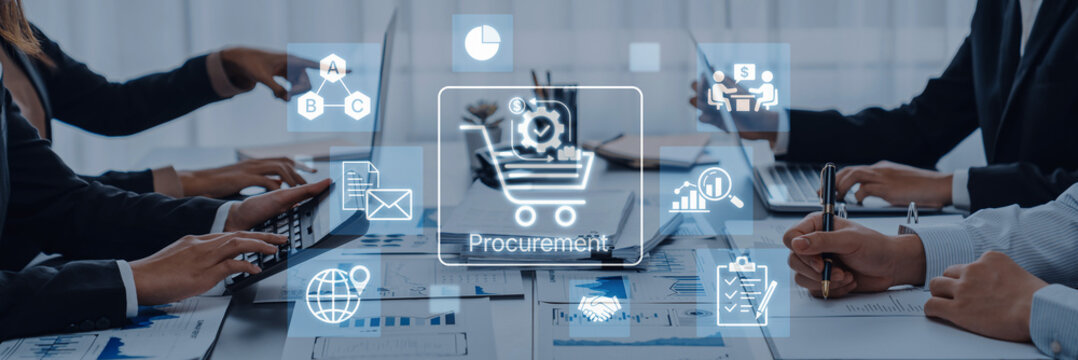 Team Collaboration in Modern Procurement Process with Digital Tools and Various Business Icons on the Table. Bitwise.