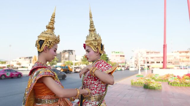 Thai Khon Dancers Adjusting Traditional Costumes Near Giant Swing in Bangkok