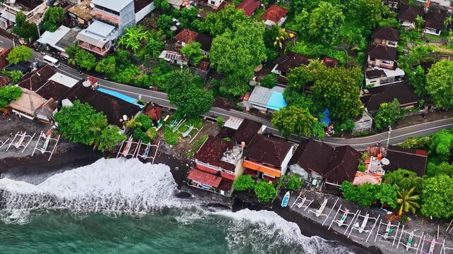 Aerial view Amed Beach, Bali coastline with traditional fishing boats