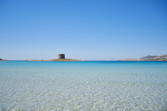 the beautiful beach of La Pelosa, with its turquoise waters, in Sardinia, Italy