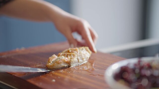 Cutting bread on cutting board