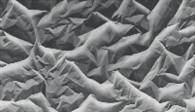 A grayscale image of crumpled paper with a highly textured surface