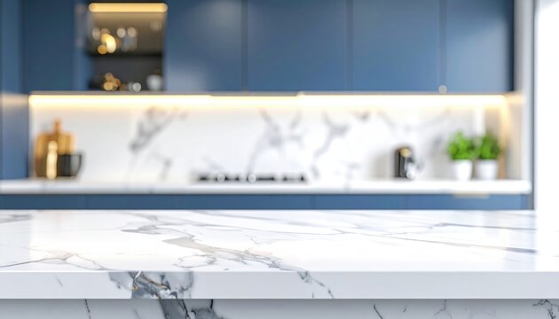 Out-of-focus kitchen showcases a white marble countertop against navy cabinets and white marble backsplash