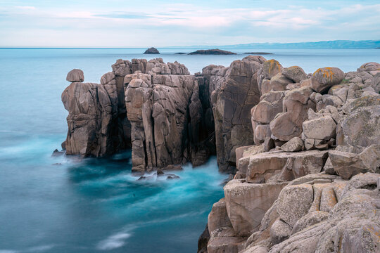 Granite rock formations in the Cliffs of Paper in San Ciprian, Lugo, Galicia, Spain.