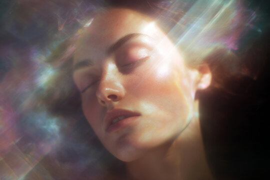 Closeup psychedelic portrait woman with kaleidoscopic light and slow exhale for surreal beauty background and meditative artwork