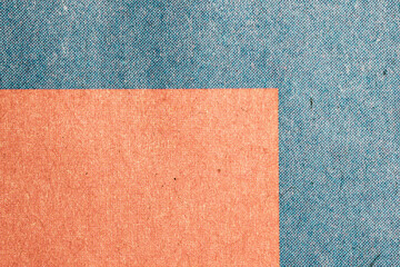 Fototapeta premium Macro Newspaper Print Paper With Orange and Blue Blocks