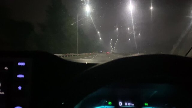POV Driving on Highway at 4 AM.
Point of view (POV) dashcam footage of driving on an empty toll road highway at 4:00 AM.