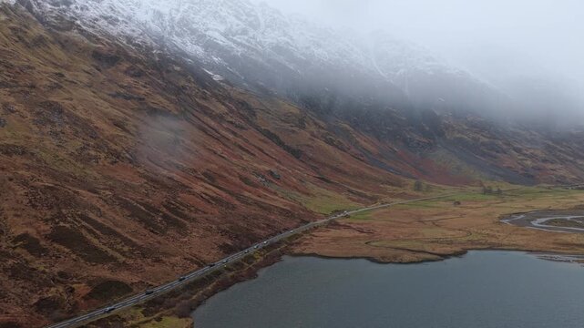 Scenic aerial view of loch achtriochtan and road in glen coe, scotland