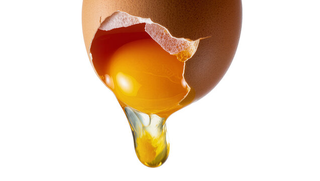 Isolated cracked brown egg with rich yellow yolk and clear white dripping down