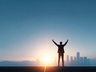 Fototapeta premium Silhouette of businessman with arms raised at sunrise over city skyline, success and victory concept