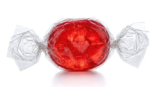 red hard candy sweet transparent cellophane wrapper isolated white background delicious sugar treat confection junk food glossy fruit flavor dessert macro snack