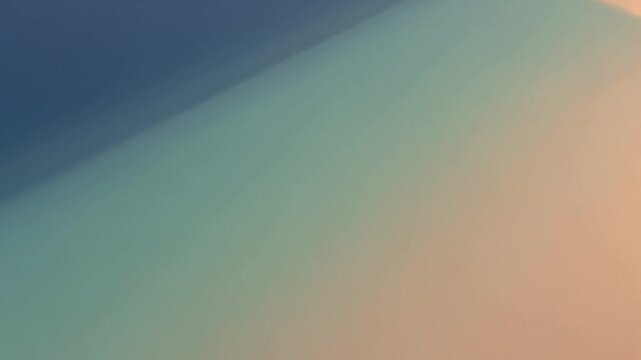 Abstract blue and beige gradient background with soft light