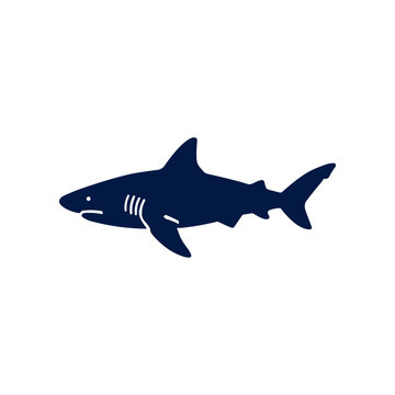 Dark blue shark fish swimming left.