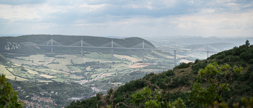 Millau Viaduct spanning the Tarn Valley in Aveyron, France. Elevated view of the famous cable stayed bridge crossing the landscape of southern France.