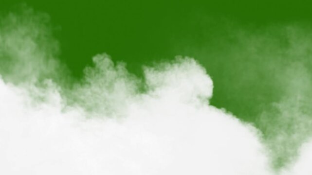 ind Blown Dense Smoke Overlay on Green Screen. Realistic Horizontal Smoke Effect Isolated on Green Screen.