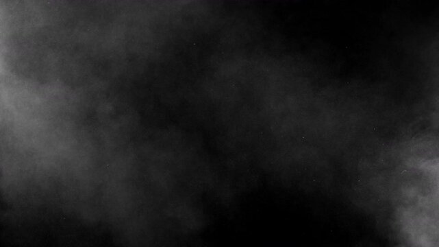 Super Slow Motion Shot of Flying Atmospheric Smoke, Isolated on Black Background , Filmed on High Speed Cinematic Camera at 1000 FPS