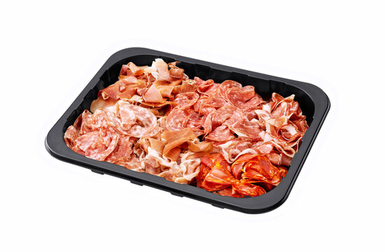 charcuterie in a plastic tray isolated on white