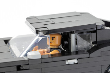 Naklejka premium Lego minifigure driver inside car