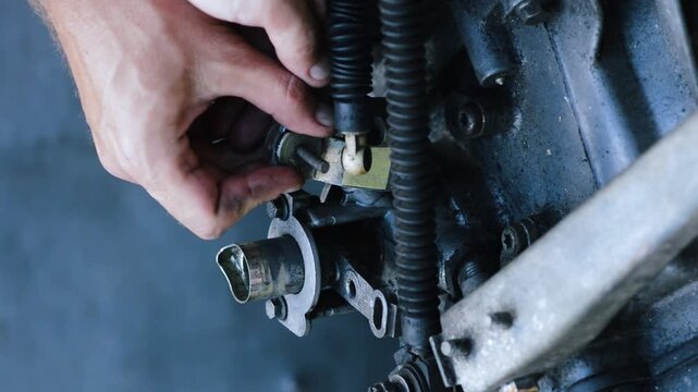 old gear shift box from a front-wheel drive car installing cables and shifting gears disassembly for repair vertical video
