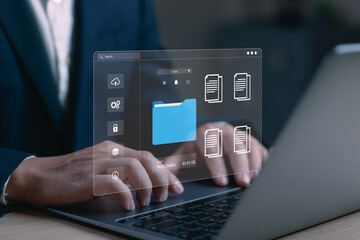 Businessman managing digital documents on laptop with cloud based file system, secure data storage, document management, information organization, workflow automation and enterprise productivity © PB Studio Photo