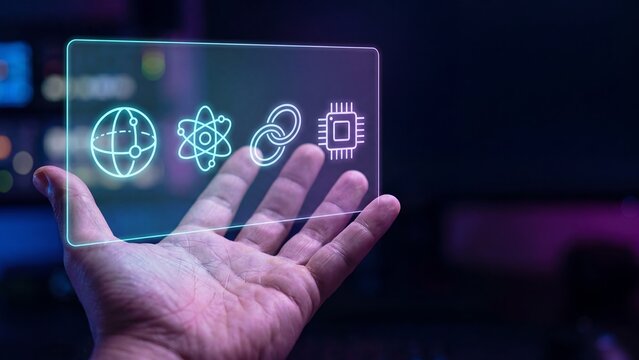 Hand holding glowing holographic transparent screen displaying globe, atom, chain link, and microchip technology icons on dark purple background. Concept of global technology, quantum computing