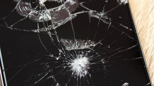 Smartphone with a broken screen. Cracked, damaged screen, broken due to a fall. Damaged smartphone screen that is not working properly. Restoration, repair, warranty,animation