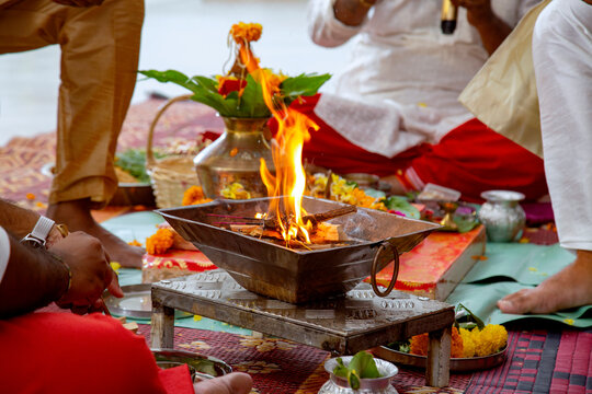 Sacred fire ceremony with offerings and prayers in a traditional Hindu ritual