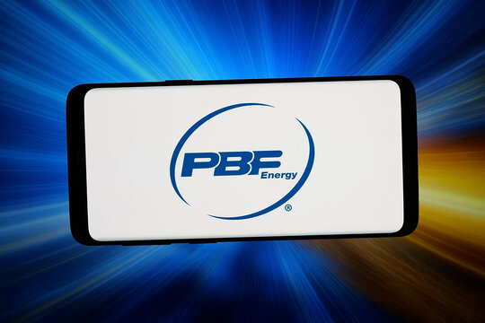 Stuttgart, Germany - 06-08-2026: In this photo illustration, the logo of US refining company PBF Energy Inc. is displayed on a smartphone in front of abstract background on computer screen.