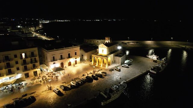 Gallipoli at night &ndash; Italy, Apulia &ndash; aerial view of the Santuario di Santa Maria del Canneto church landing