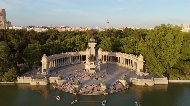 Drone tracking shot of Alfonso XII monument in El Retiro park