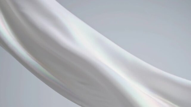 Elegant white silk fabric flowing in the wind with soft iridescent light reflections