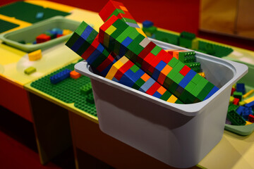 Naklejka premium Lego construction set. Background made of colorful Lego bricks.