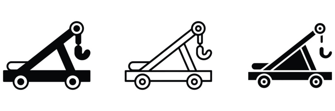 Tow truck icons in black and white for vehicle recovery and transportation services