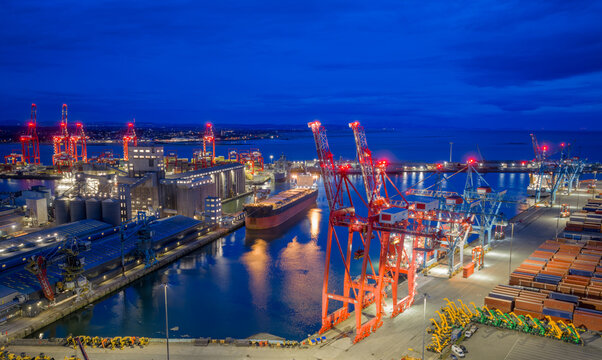 Port of Liverpool in Merseyside, England, viewed from above with container cranes, cargo ships and stacked containers. Major UK maritime and logistics hub on the River Mersey.
