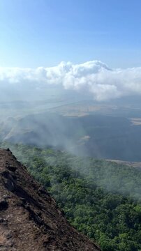 Pimpalgoan joga Dam with cloud movement seen from Taramati Peak, Western Ghats of India.