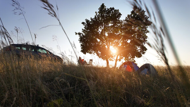 Camping in nature, enjoying outdoors in summertime.