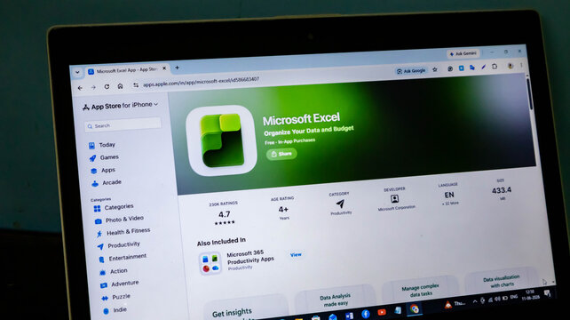 A laptop screen displaying the apple app store page for the microsoft excel application for iphone
