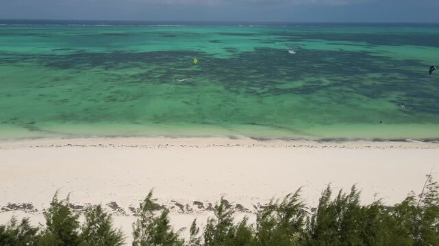 Aerial view of kitesurfing on paje beach, zanzibar