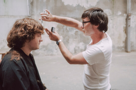 Hair Stylist Creates a New Look for a Client