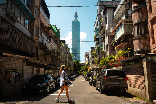 Woman walking in Taipei street