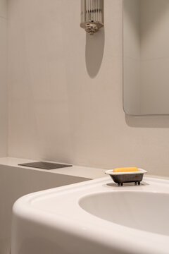 Sink detail with soap and soft shadow