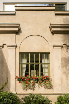 Symmetrical facade with window and flower box